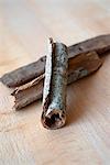Cassia cinnamon bark on a wooden table