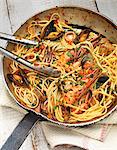 Linguine with seafood in a pan