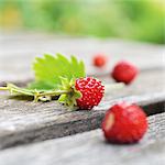 Wild strawberries on a garden table