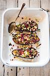 Roasted aubergines with feta cheese and pomegranate seeds