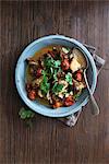 Lamb stew with cherry tomatoes and coriander