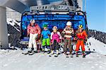 Ski holiday, Children in ski lift, Sudelfeld, Bavaria, Germany
