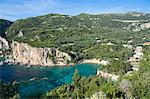 Paleokastritsa beach resort with cliffs and turquoise Ionian Sea in Corfu, Ionian Islands, Greek Islands, Greece, Europe