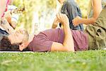 Man napping at picnic