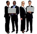 Two business teams posing with laptop over white background