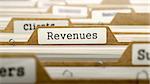 Revenues Concept. Word on Folder Register of Card Index. Selective Focus.