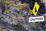 caution rock slide sign on Ballybunion beach in county Kerry Ireland
