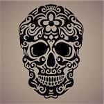 The ornamental art of a skull, possible for use as a tattoo. Vector image.