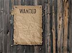 Wild West wanted poster on weathered plank wood wall