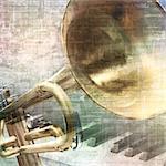 abstract grunge vintage music background with trumpet and piano keys