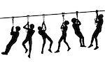 Silhouettes of children playing with a tyrolean traverse