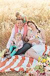 Happy family in meadow