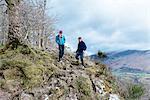 Young couple hiking, Derwent Water, Keswick, Lake District, Cumbria, United Kingdom