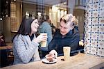 Young couple in cafe