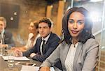 Portrait confident businesswoman in conference room meeting