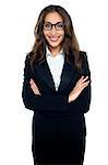 Bespectacled smiling businesswoman portrait isolated. Female model with long hair