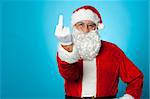 Agitated Santa showing his middle finger to the camera