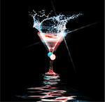 colourful cocktail on the black background. Party club entertainment. Mixed light