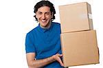 Man moving cartons, relocation concept