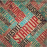 Startup - Red Word on Grunge Word Collage on Old Fulvous Paper.