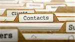 Contacts Concept. Word on Folder Register of Card Index. Selective Focus.