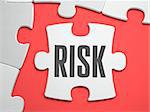 Risk - Text on Puzzle on the Place of Missing Pieces. Scarlett Background. Close-up. 3d Illustration.