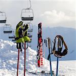Protective sports equipments on ski poles at ski resort at sunny day