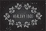 Healthy food. Hand-sketched frame on chalkboard background. Suitable for ads, signboards, packaging and identity and web designs.