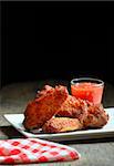 Fried Chicken Wings on wood  background