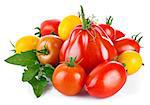 Fresh tomatoes with green leaves. Isolated on white background