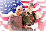 Solider reunited with parents against rippled us flag