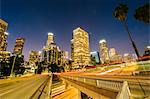 View of city skyscrapers and highway at night, Los Angeles, California, USA