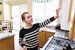 Woman working in kitchen