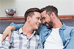 Homosexual couple men laughing together
