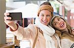 Smiling women making a selfie