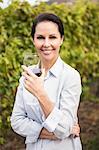 Smiling woman holding a wineglass