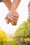 Close up view of couple holding hands