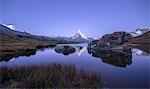 The Matterhorn reflected in Stellisee at sunrise, Zermatt, Canton of Valais, Pennine Alps, Swiss Alps, Switzerland, Europe