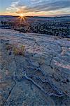 Sunrise from atop a sandstone hill, Grand Staircase-Escalante National Monument, Utah, United States of America, North America