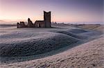 Abandoned ruin of Knowlton Church at dawn on a frosty winter morning, Dorset, England, United Kingdom, Europe