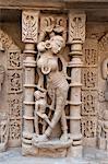 Carved dancing girl on wall of Rani ki Vav, 11th century stepwell dedicated to Hindu god Lord Vishnu, Patan, Gujarat, India, Asia