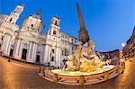 Bernini's Fountain of the Four Rivers and church of Sant'Agnese in Agone at night, Piazza Navona, Rome, Lazio, Italy, Europe