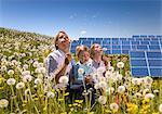 Father and children with solar panels