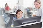 Businesswomen working at computer in office