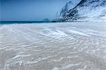 Beach partially snowy surrounded by mountains, Haukland, Lofoten Islands, Northern Norway, Scandinavia, Arctic, Europe
