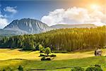 Colorful Alpine landscape scenery with sun settingm Tirol, Austria