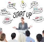 Businesswoman doing speech during meeting  against start up doodle