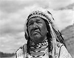 1960s PORTRAIT NATIVE AMERICAN MAN CHIEF BLACKFOOT INDIAN TRIBE IN BROWNING MONTANA