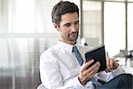 Businessman using digital tablet