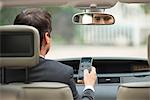 Using cell phone while driving car